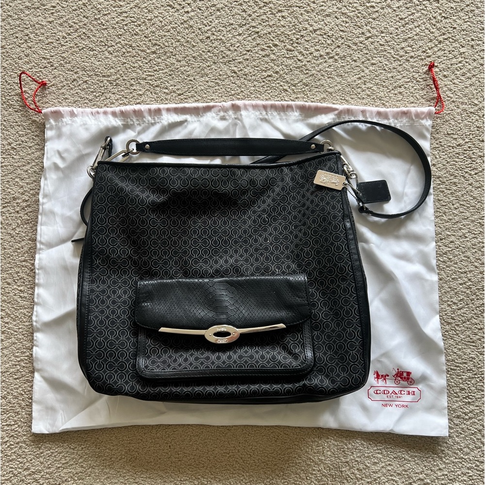 Coach large bag black w/ gray. Silver hardware. Turquoise inside. Used 2 times.